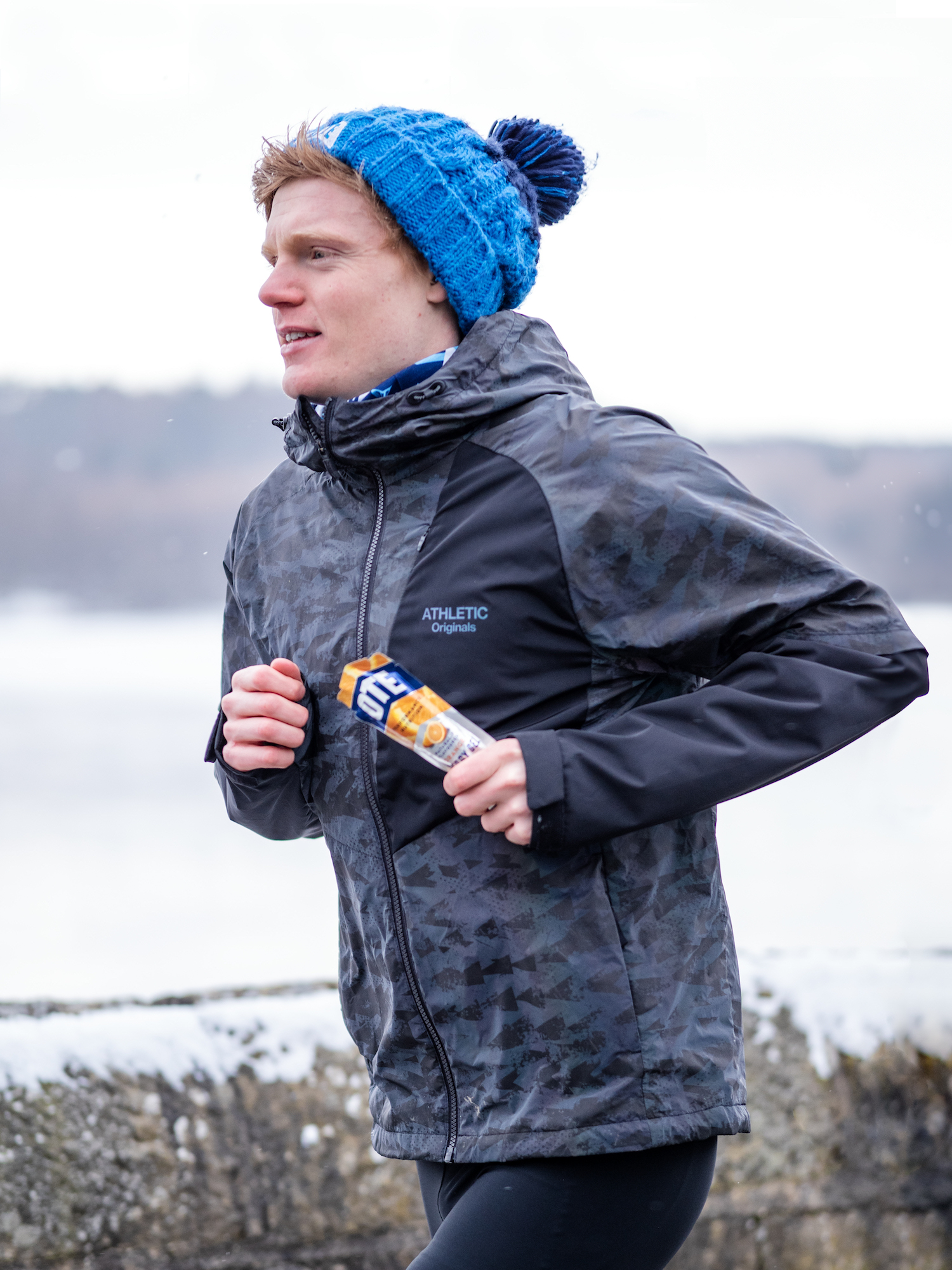 running with orange energy gel