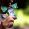 Eating Plant-based protein bar